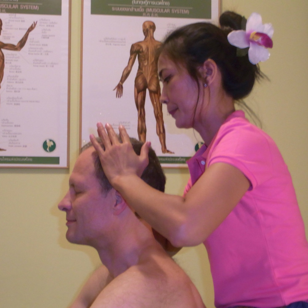 Thailändische Kopfmassage